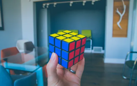 A Rubik's cube, representing a solution being solved piece by piece